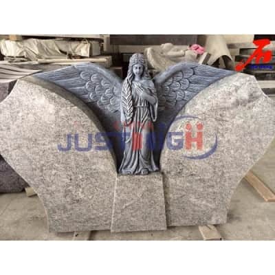 Symmetrical style tombstone with Stand up angel statue in the middle