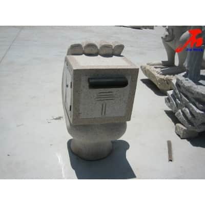 stone mailbox with hand carving