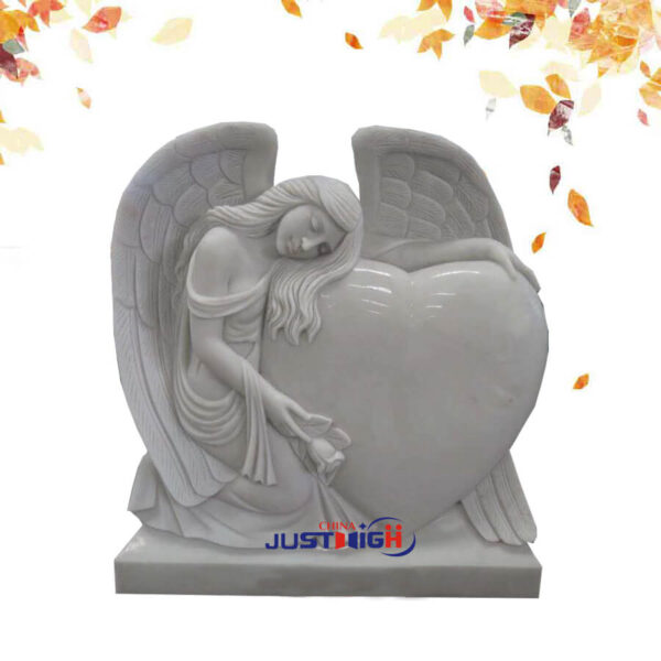 marble angel with heart shape headstone