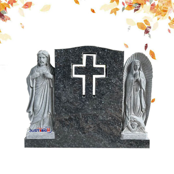 Religious tombstone with carvings of Jesus and Virgin Mary