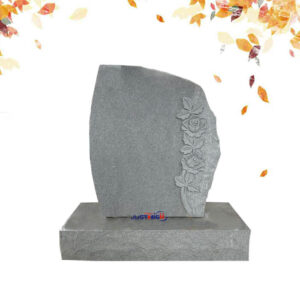 upright headstone with folwer carving