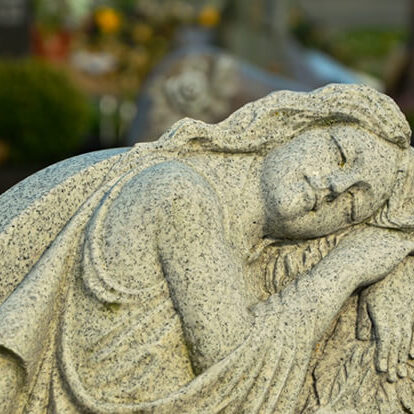 headstone face on a grave