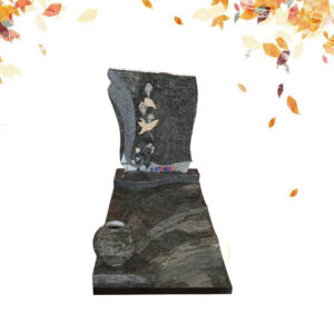 Granite tombstone with calla lily carving