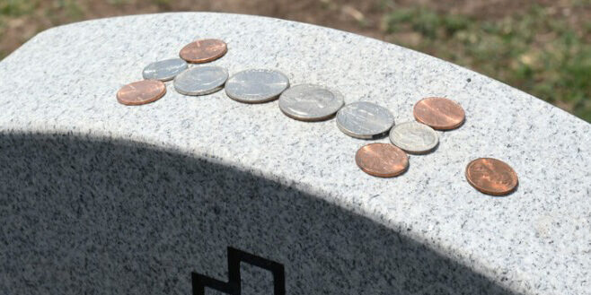 penny on a gravestone penny on a gravestone