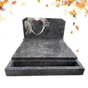 Big set of granite tombstones with heart shape carvings