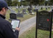 How do cemeteries determine the exact location of each burial plot